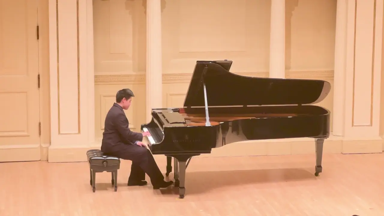 Still from Lala’s solo piano performance